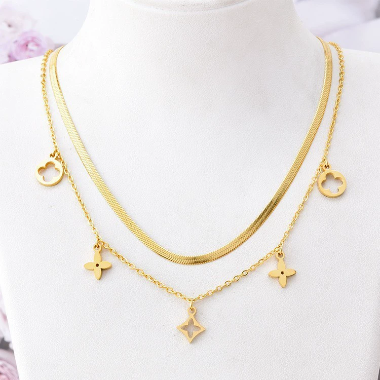 Double-Layer Flat Snake Collarbone Chain Necklace with Irregular Four-Leaf Flower Pendant